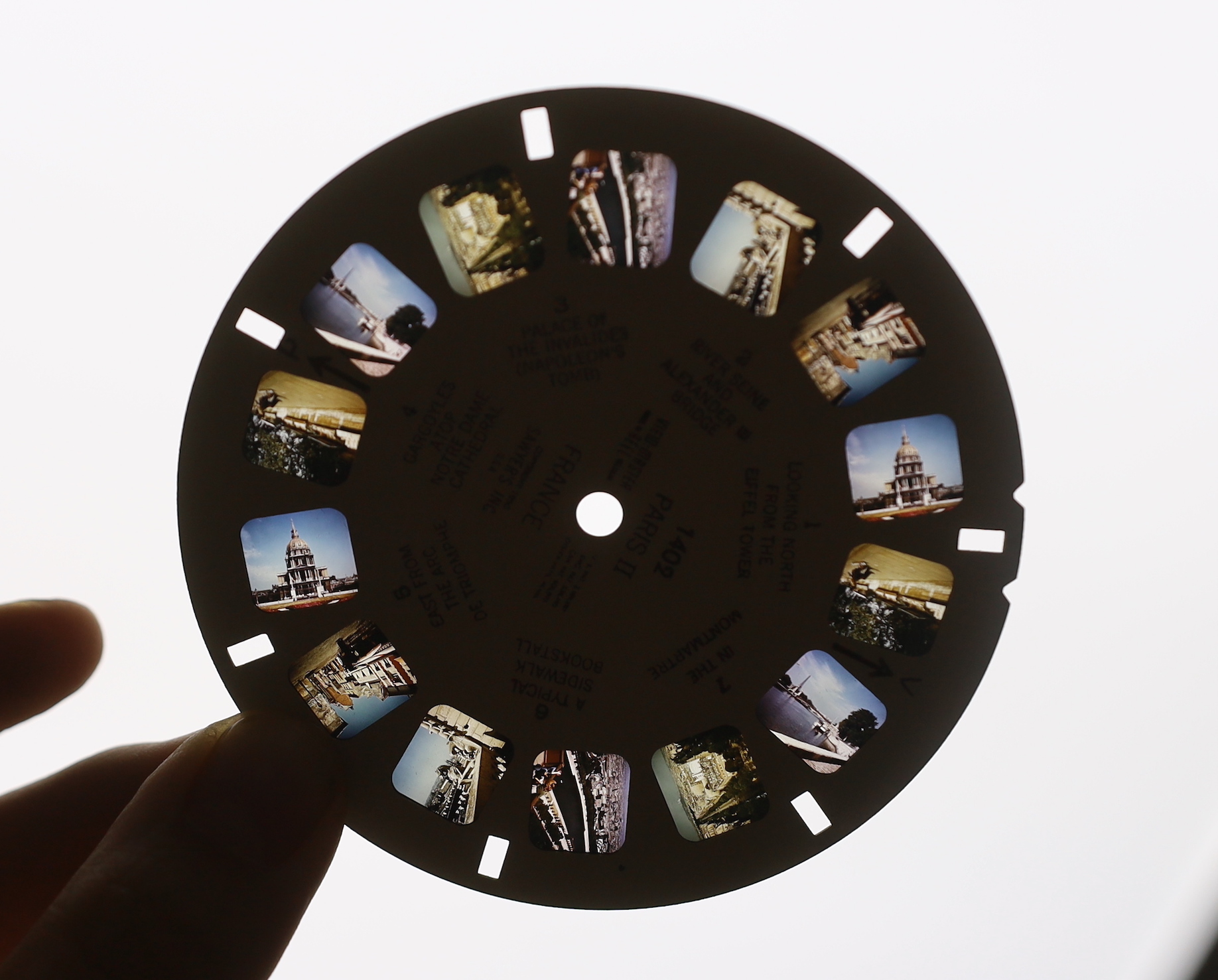 Three View-Master projectors and four View-Master viewers, together with eight View-Master plastic boxes containing a large quantity of reels with subjects including views of the United States, National Parks, Italy, Ger